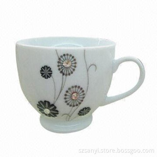 Porcelain cup and saucer with diamond designs